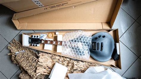 electric box guitar price|cheapest way to ship guitar.